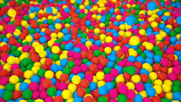 istock Multicolored spheres closeup in pool for children fun abstract background 1179622913
