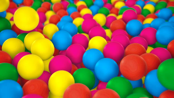 istock Multicolored spheres closeup in pool for children fun abstract background 1179622932