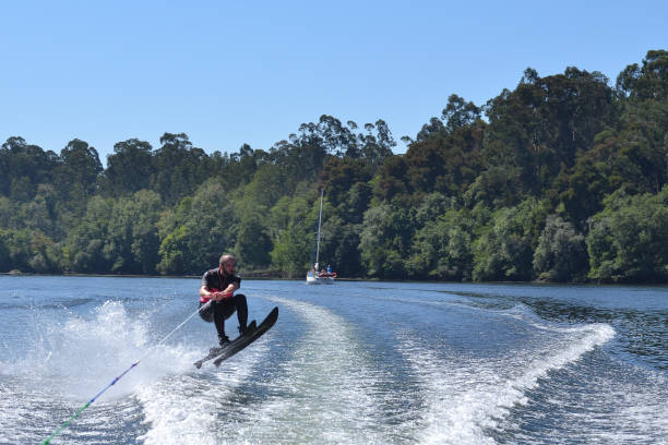 istock Young man waterskiing over the Minho river 1179625973