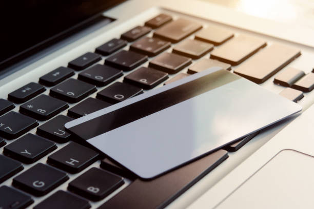 istock Credit card on laptop. Online payment concept 1179627001