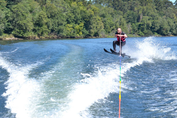 istock Young man waterskiing over the Minho river 1179627280