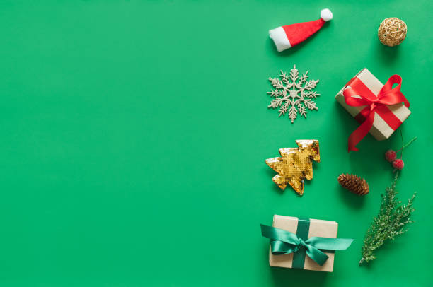 istock Christmas background with gift present over green background with copy space. flatlay topview 1179627368