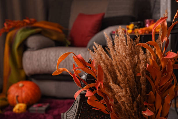 istock An autumn vintage decorative composition with dried flowers. 1179627402