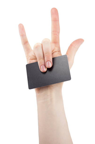 holding blank for card hand with rock and roll sign holding blank for card, Bank card, isolated on white background, copy space, mock up rocker nails stock pictures, royalty-free photos & images