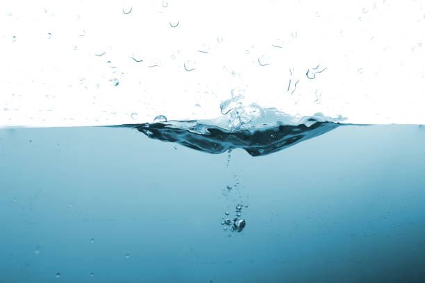 istock Water splash or water wave with bubbles of air on the background. 1179628055
