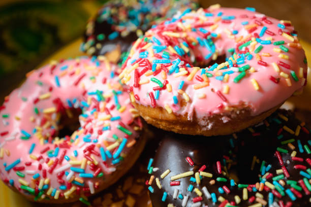 istock donuts, close-up photo with selective focus - assorted donuts with chocolate frosted, 1179631603