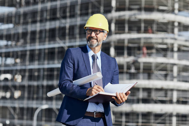 istock senior businessman architect helmet construction site building architecture 1179632002