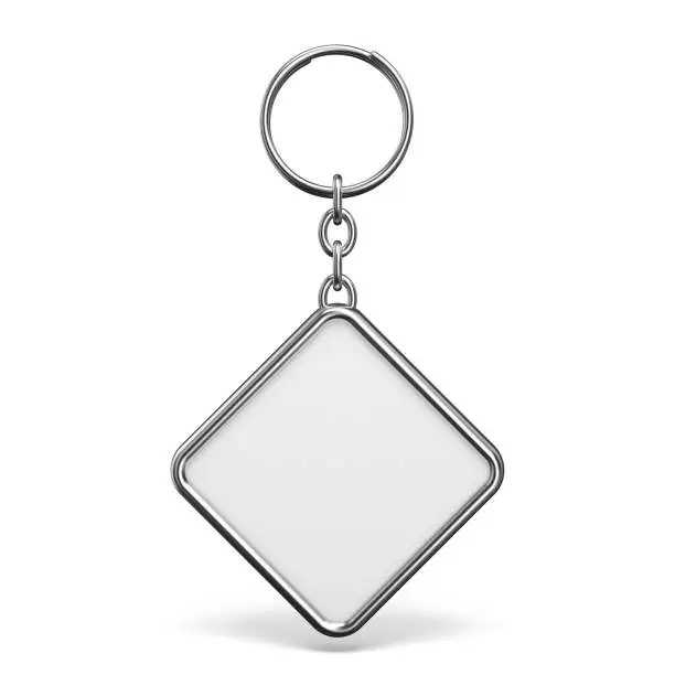 Photo of Blank metal trinket with a ring for a key rhombus shape 3D