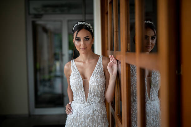 istock Beautiful bride posing in lobby 1179632163