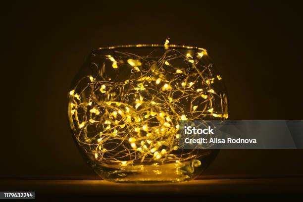 Christmas Composition With Glass Bowl Light Chain Stock Photo - Download Image Now - Drinking Glass, LED Light, Lighting Equipment