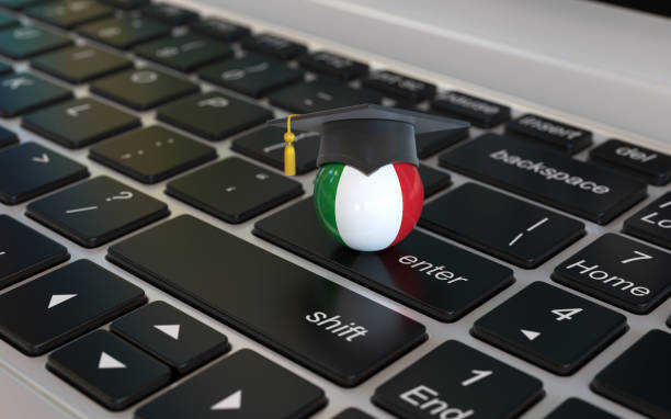 istock Italian flag with graduation cap on laptop keyboard 1179632963