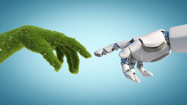 nature and technology abstract concept, robot hand and natural hand covered with grass - unity ideas gear concepts imagens e fotografias de stock