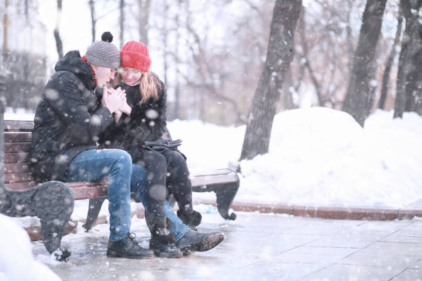 istock Young couple walking through the winter 1179634926