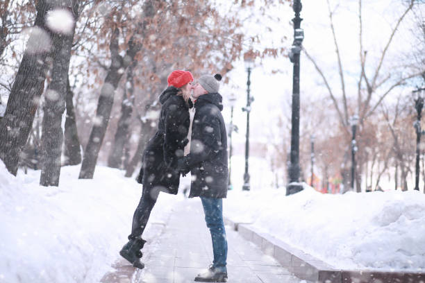 istock Young couple walking through the winter 1179635038