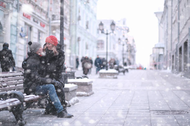 istock Young couple walking through the winter 1179635824