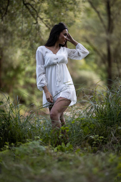 istock Beautiful woman in nature 1179637249