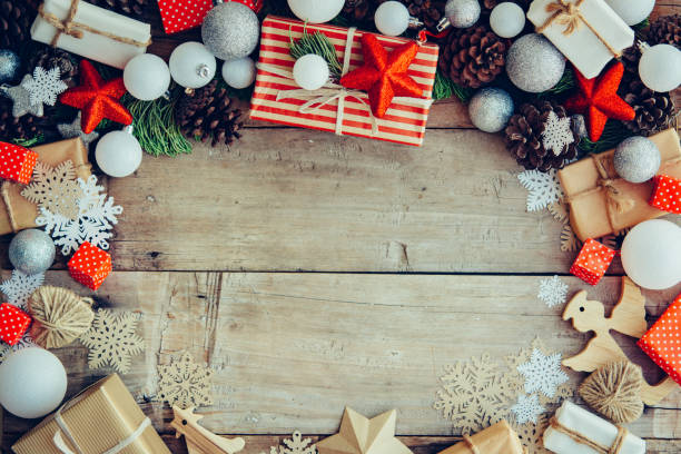 istock Christmas background with gift boxes and decorations on the wood 1179637722