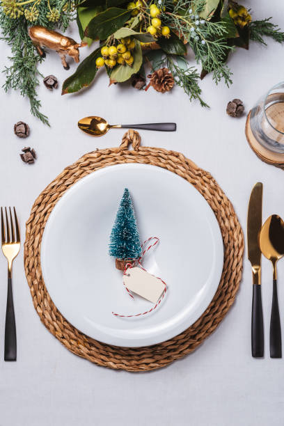istock Elegant Christmas place settings, Pine tree figurine on the dish from above 1179638132