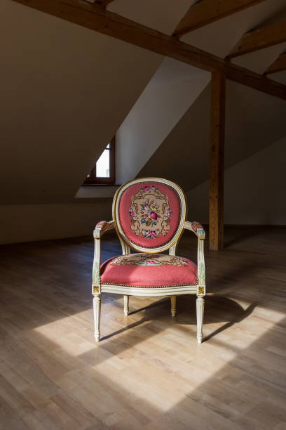 istock Chair in the attic 1179640186