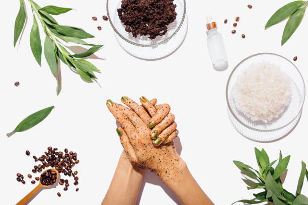 istock Female's hands applying homemade coffee scrub 1179640483