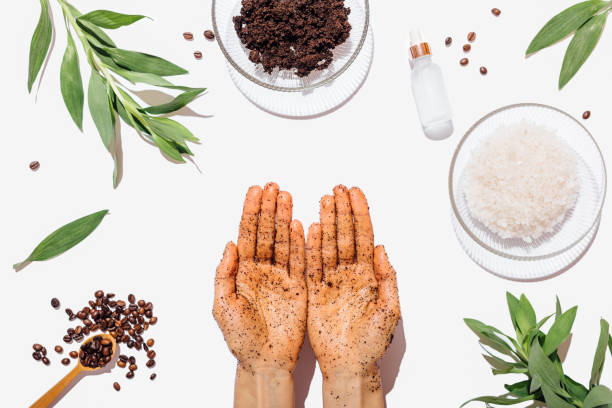 istock Female's hands using natural homemade coffee scrub 1179640500