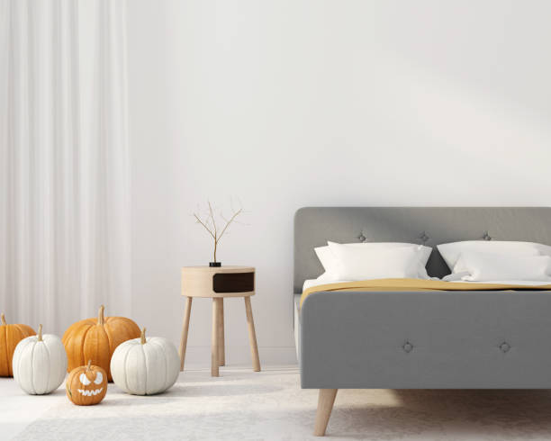 istock Bedroom interior with pumpkins. Decoration for Halloween 1179641893