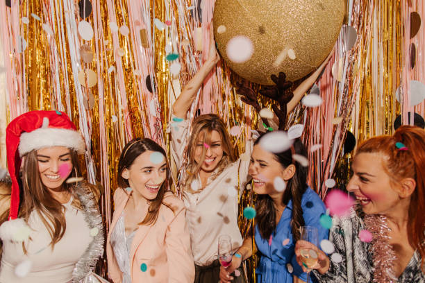 istock Girlfriends drinking champagne on New Year's Eve 1179641895