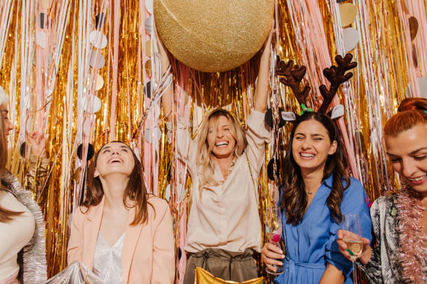 istock Girlfriends drinking champagne on New Year's Eve 1179641973