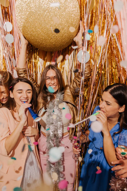 istock Girlfriends celebrating New Year's Eve 1179641998