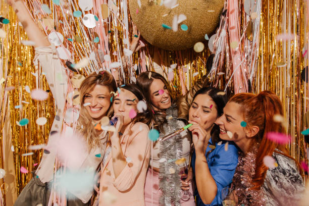 istock Girlfriends celebrating New Year's Eve 1179642040