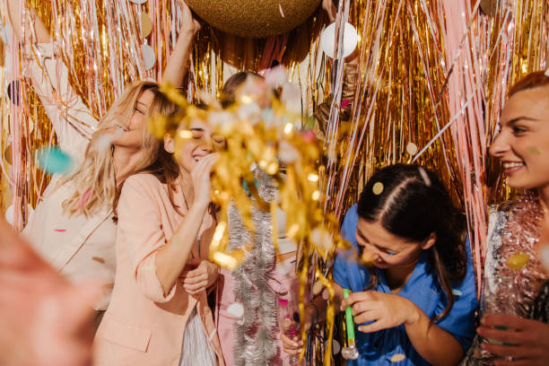 istock Girlfriends celebrating New Year's Eve 1179642132