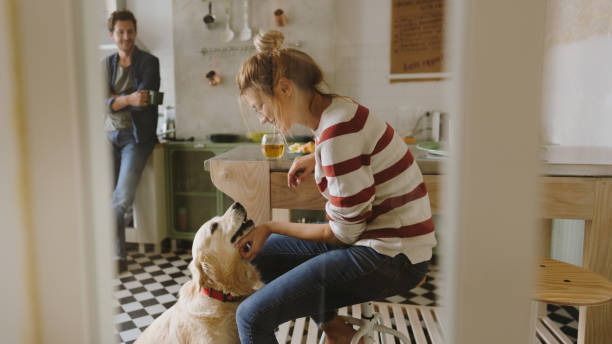 istock Morning in the kitchen with our dog 1179643713