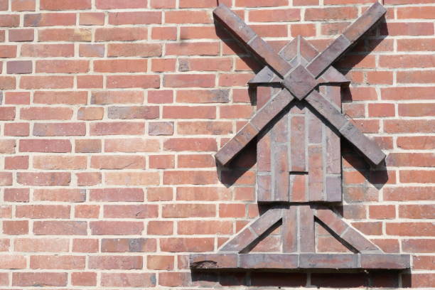 Special brickwork, with the image of a mill.