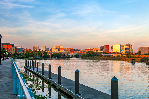 The Christina River Walk offers a perfect view of the Wilmington DE Skyline.