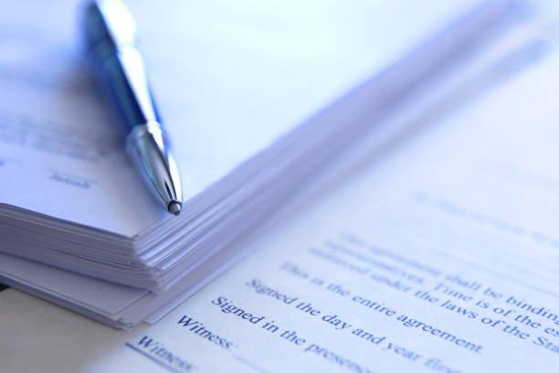 Business contract working hard with document contract at the desk. Justice and legal law concept.