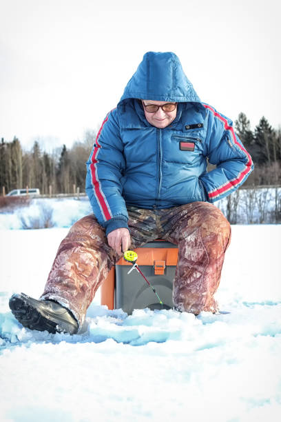 istock Lake Winter Fisherman 1179649040