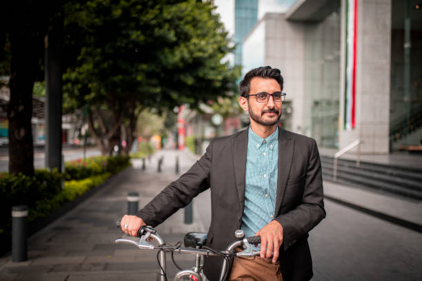 istock Businessman going to work on a bicycle 1179650212
