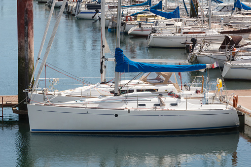 Sailboat moored at the pontoon in Moulin Blanc Harbor in Brest