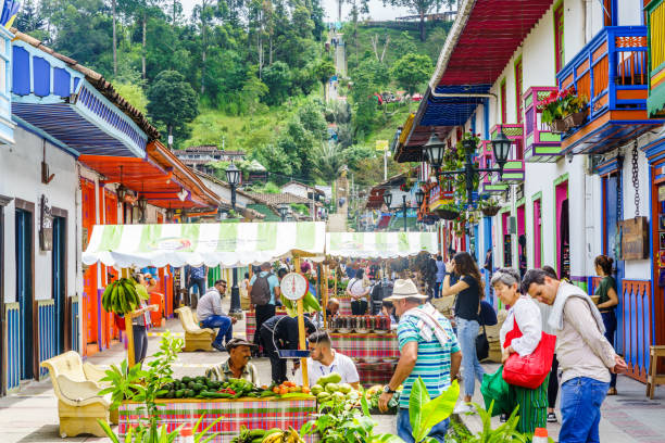 Local market with sellers in the streets of the village Salento - Colombia stock photo