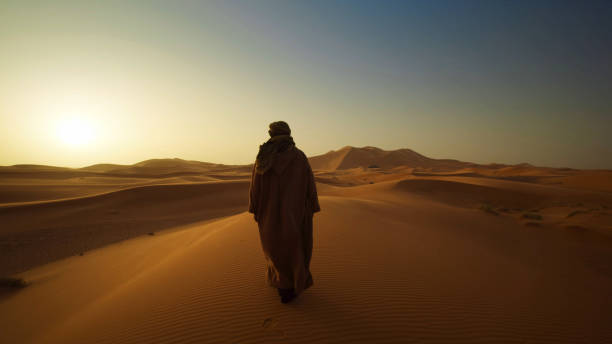 istock The Bedouin is walking through the desert 1179655411