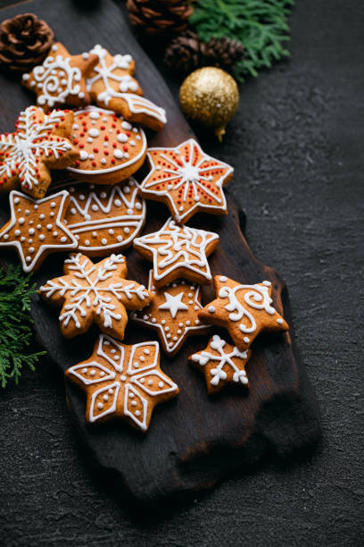 istock Christmas greeting card with gingerbread cookies 1179656385