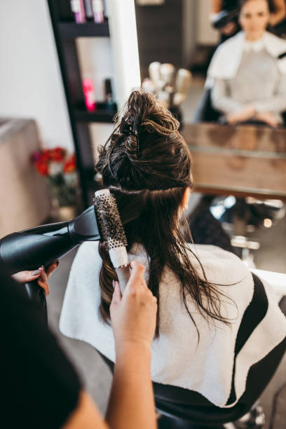istock Woman at hair salon 1179656818