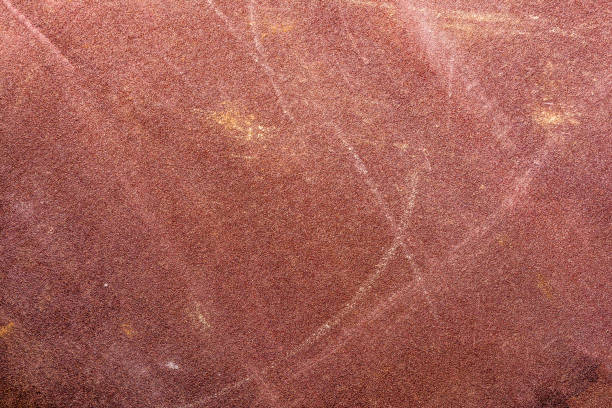 istock worn texture of sandpaper, close-up abstract background 1179656904