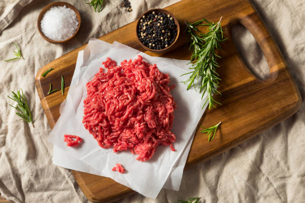 Raw Organic Red Ground Minced Beef Raw Organic Red Ground Minced Beef Ready to Cook ground beef photos stock pictures, royalty-free photos & images