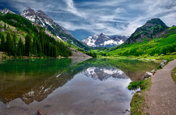 Maroon Bells reflection in Maroon Lake near Aspen. Elk Mountains. White River National Forest.  Colorado. United States of America ice lakes colorado stock pictures, royalty-free photos & images