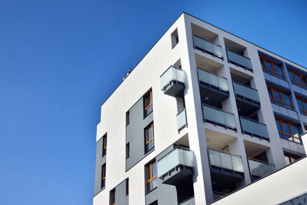 istock Modern apartment buildings on a sunny day with a blue sky. 1179660969