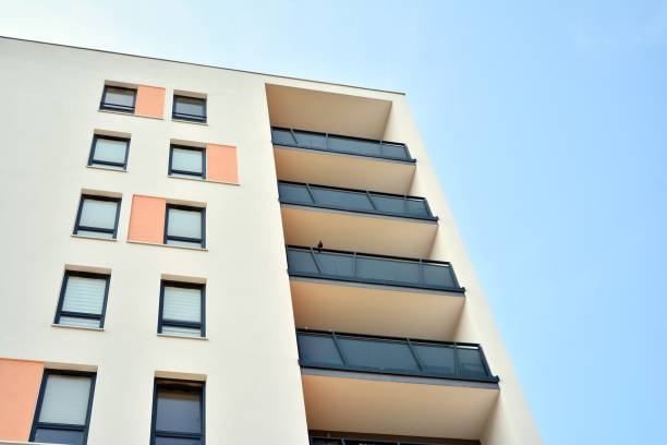 istock Modern apartment buildings on a sunny day with a blue sky. 1179662698