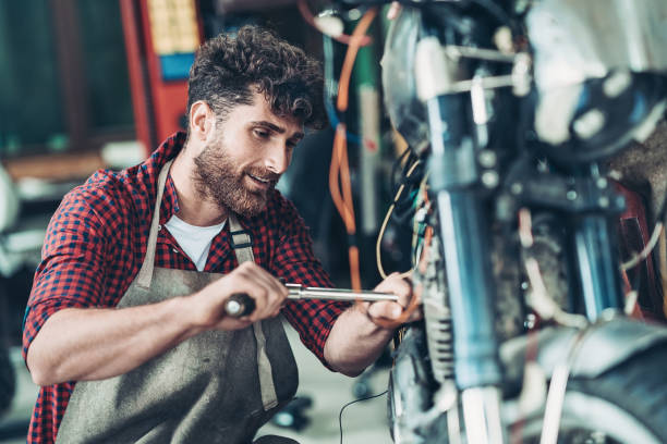 istock Mechanic building a custom motorcycle 1179664244