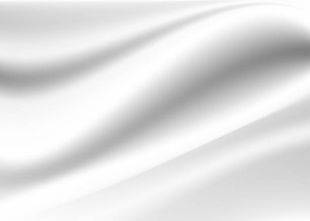 istock abstract background clean luxury cloth or liquid wave or wavy folds of white and gold or pearl fabric texture background. 1179665070