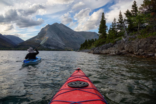 istock Man Kayaking in Glacier Lake 1179665437